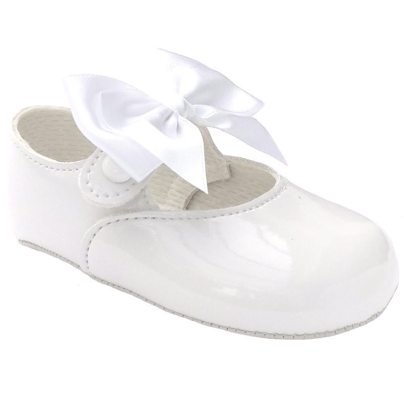 white pram shoes girl